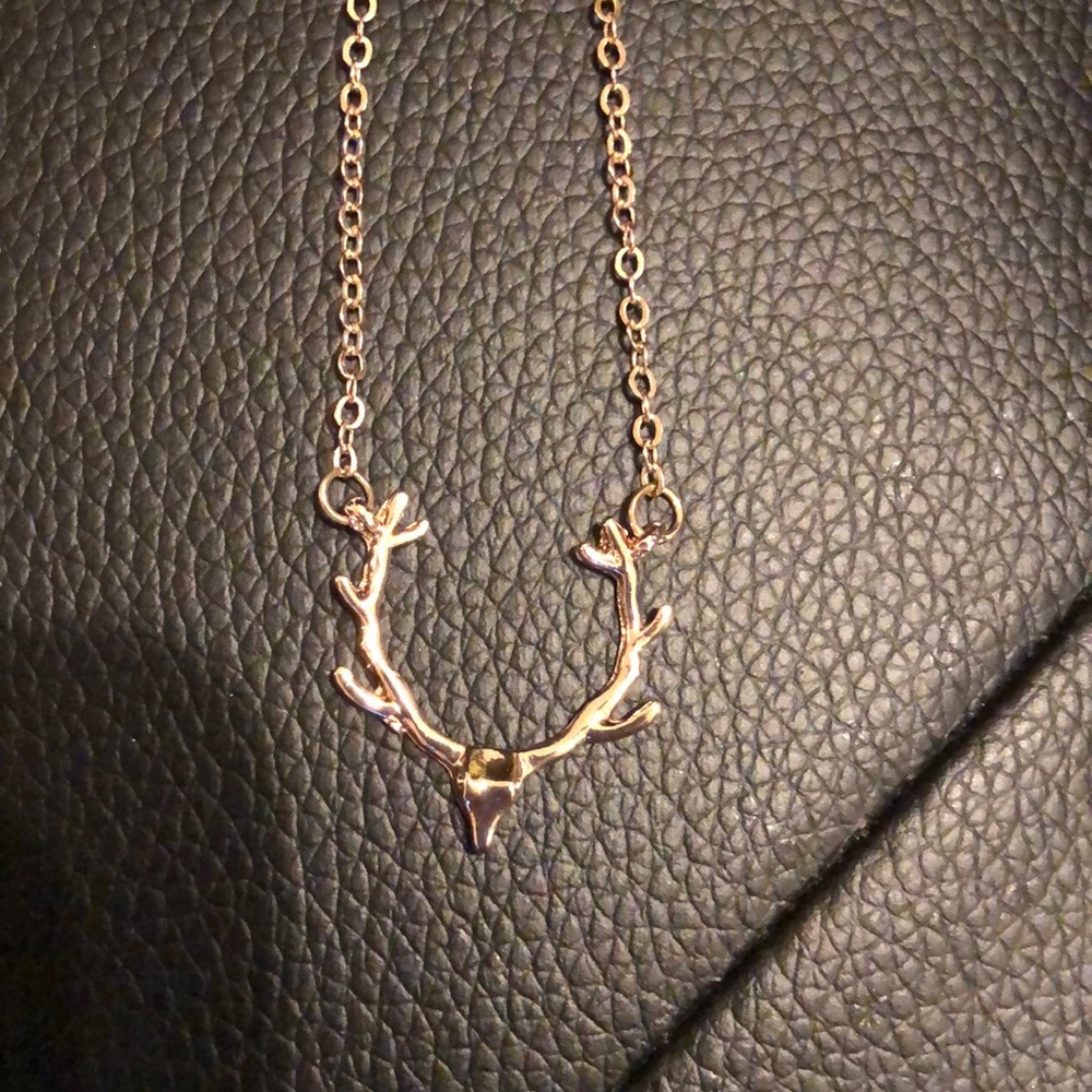 Necklace delicate deer with antlers in gold tone